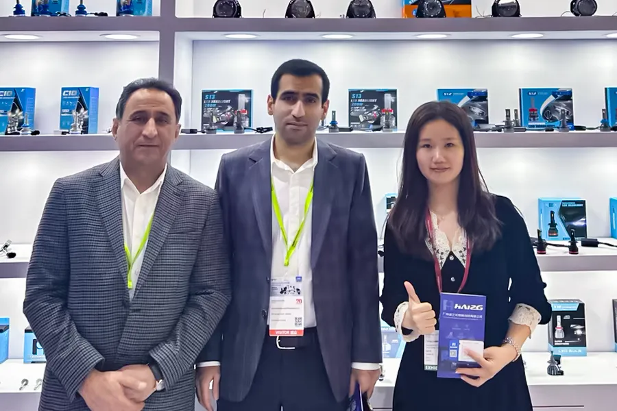 HAIZG booth meeting wholesale buyers at an international automotive lighting trade show